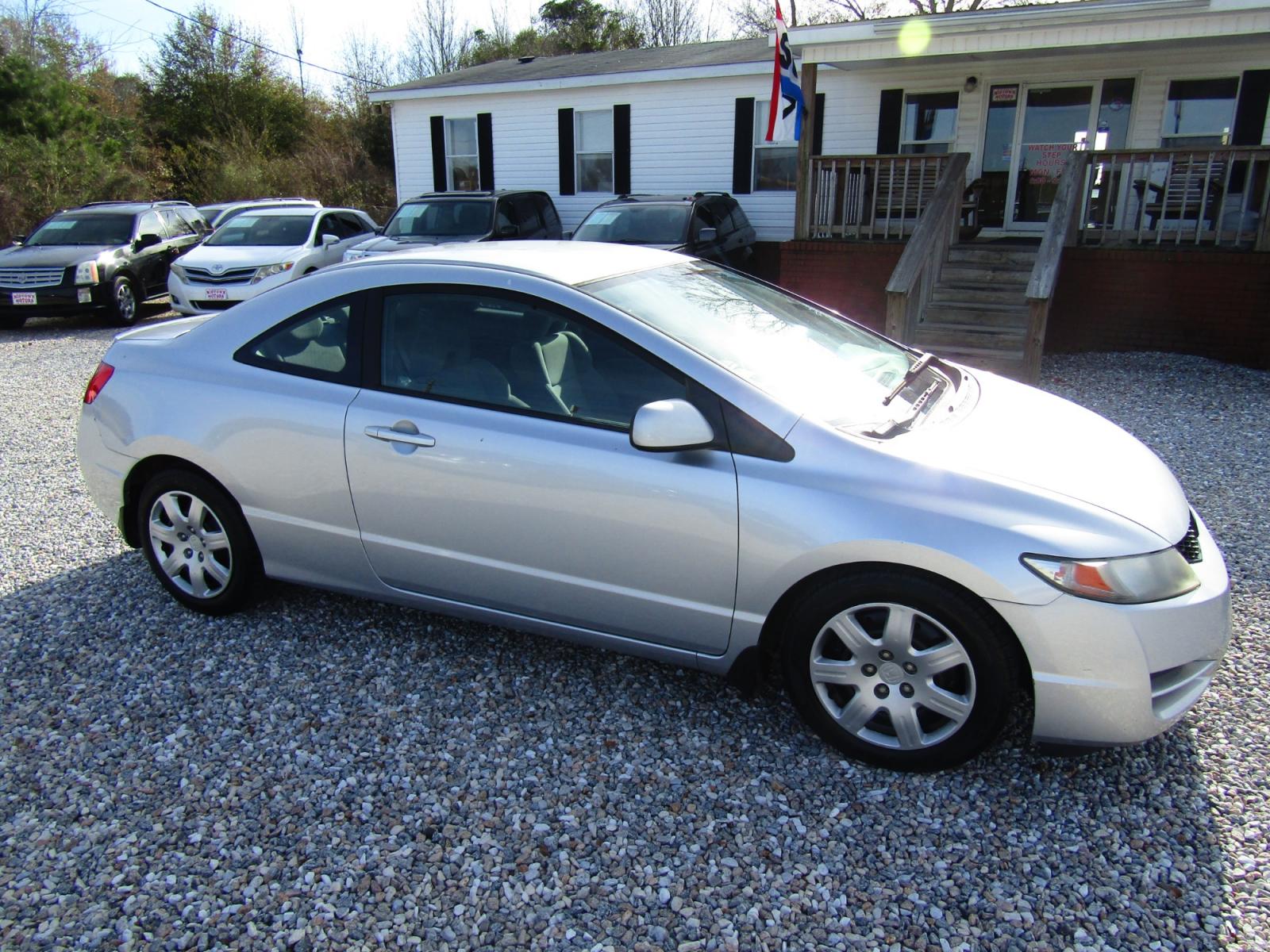 2011 Silver Honda Civic LX Coupe 5-Speed AT (2HGFG1B66BH) with an 1.8L L4 SOHC 16V engine, Automatic transmission, located at 15016 S Hwy 231, Midland City, AL, 36350, (334) 983-3001, 31.306210, -85.495277 - Photo #0
